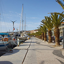 embankment with palm trees and yachts in Argostoli town , Kefalonia, Ionian islands, Greece