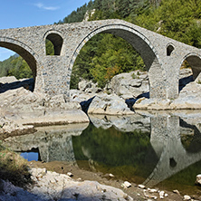 Reflection of Devil Bridge in Arda river, Kardzhali Region, Bulgaria