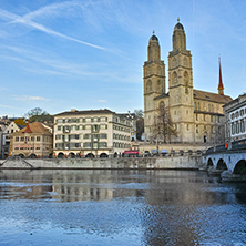 Church of Grossmunster and reflection in Limmat River, Zurich, Switzerland