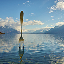 Giant steel fork in water of Geneva lake, Vevey, Switzerland