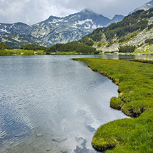 green meadows and Muratovo lake, Pirin Mountain, Bulgaria