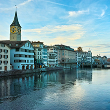 Sunset over  city of Zurich and reflection in Limmat River, Switzerland