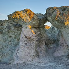 The first rays of the sun over  The Stone Mushrooms near Beli plast village, Kardzhali Region, Bulgaria