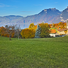 Amazing panorama of Lake Thun and typical Switzerland village near town of Interlaken, canton of Bern