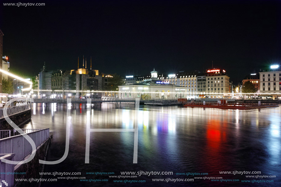 Night lights of city of Geneva and Reflectionin the lake, Switzerland