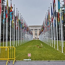 United nations building with flags in Geneva, Switzerland
