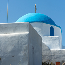 Amazing White chuch with blue roof in town of Parakia, Paros island, Cyclades, Greece