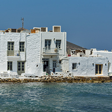 White house and Bay in Naoussa town, Paros island, Cyclades, Greece