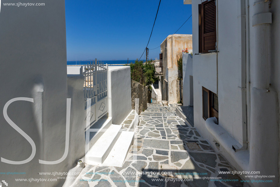 Street and white houses in Chora town, Naxos Island, Cyclades, Greece