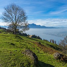 Panoramic view to Mount Pilatus and Lake Lucerne covered with frog, Alps, Switzerland