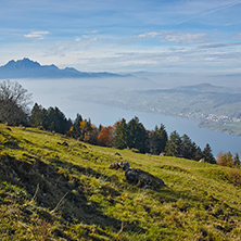 Amazing Panorama of Mount Pilatus and Lake Lucerne covered with frog, Alps, Switzerland