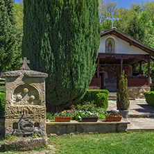 Stone fountain and church in  Temski monastery St. George, Pirot Region, Republic of Serbia