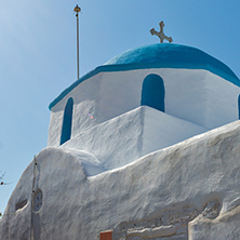 Amazing view of White chuch with blue roof in town of Parakia, Paros island, Cyclades, Greece