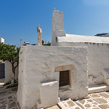 White chuch and street in town of Parakia, Paros island, Cyclades, Greece
