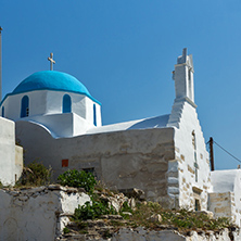 White chuch with blue roof in town of Parakia, Paros island, Cyclades, Greece