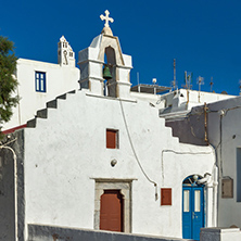 White orthodox church and belfry in Mykonos, Cyclades Islands, Greece