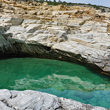 Clean waters of Giola Natural Pool in Thassos island, East Macedonia and Thrace, Greece