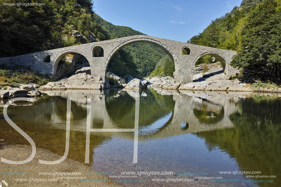 Amazing Reflection of Devil"s Bridge in Arda river and Rhodopes mountain, Kardzhali Region, Bulgaria