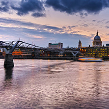 Night photo of St Paul"s Cathedral and Millennium Footbridge over the Thames, London, England, Great Britain