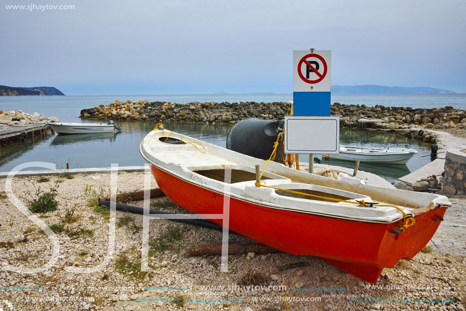Boat at Small port on the coastline of Kefalonia, Ionian Islands, Greece