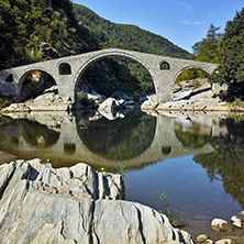 Amazing Reflection of The Devil"s Bridge in Arda river and Rhodopes mountain, Kardzhali Region, Bulgaria