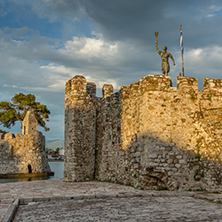 Sunset seascape of Fortification at the port of Nafpaktos town, Western Greece