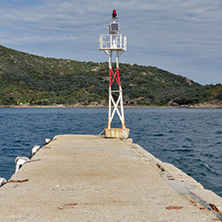 Lighthouse at the port of Ammouliani island, Athos, Chalkidiki, Central Macedonia, Greece