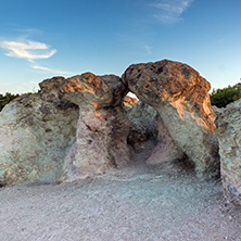 The first rays of the sun over  The Stone Mushrooms near Beli plast village, Kardzhali Region, Bulgaria