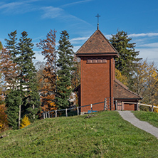 Old church and autumn trees near mount Rigi, Alps, Switzerland
