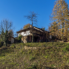 Panorama with Old house with courtyard in village of Bozhentsi, Gabrovo region, Bulgaria