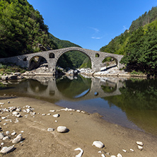 Amazing Reflection of The Devil"s Bridge in Arda river and Rhodopes mountain, Kardzhali Region, Bulgaria