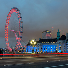 LONDON, ENGLAND - JUNE 16 2016: Night photo of The London Eye and County Hall from Westminster bridge, London, England, Great Britain