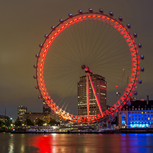 LONDON, ENGLAND - JUNE 16 2016: Night photo of The London Eye and County Hall, Westminster, London, England, Great Britain