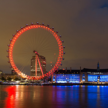 LONDON, ENGLAND - JUNE 16 2016: Night photo of The London Eye and County Hall, Westminster, London, England, Great Britain