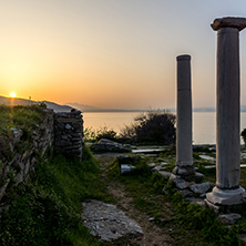 Amazing sunset with ancient columns on Evraiokastro Archaeological Site, Thassos town, East Macedonia and Thrace, Greece