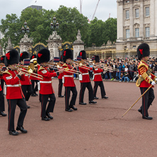 LONDON, ENGLAND - JUNE 17 2016: British Royal guards perform the Changing of the Guard in Buckingham Palace, London, England, Great Britain
