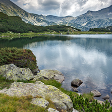 Reflection of Banderishki Chukar Peak in Muratovo lake, Pirin Mountain, Bulgaria