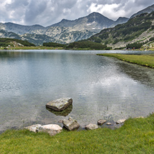 Banderishki Chukar Peak and reflection in Muratovo lake, Pirin Mountain, Bulgaria