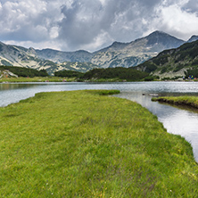 Panorama of Banderishki Chukar and reflection in Muratovo lake, Pirin Mountain, Bulgaria