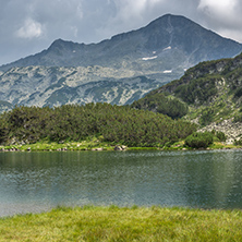 Amazing Panorama of Banderishki Chukar and reflection in Muratovo lake, Pirin Mountain, Bulgaria
