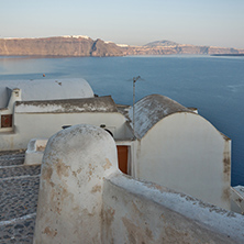 Seascape with White houses in town of Oia, Santorini island, Thira, Cyclades, Greece