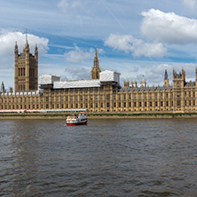 LONDON, ENGLAND - JUNE 19 2016: Cityscape of Westminster Palace and Thames River, London, England, United Kingdom