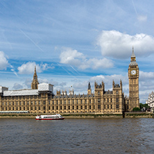 LONDON, ENGLAND - JUNE 19 2016: Cityscape of Westminster Palace and Thames River, London, England, United Kingdom