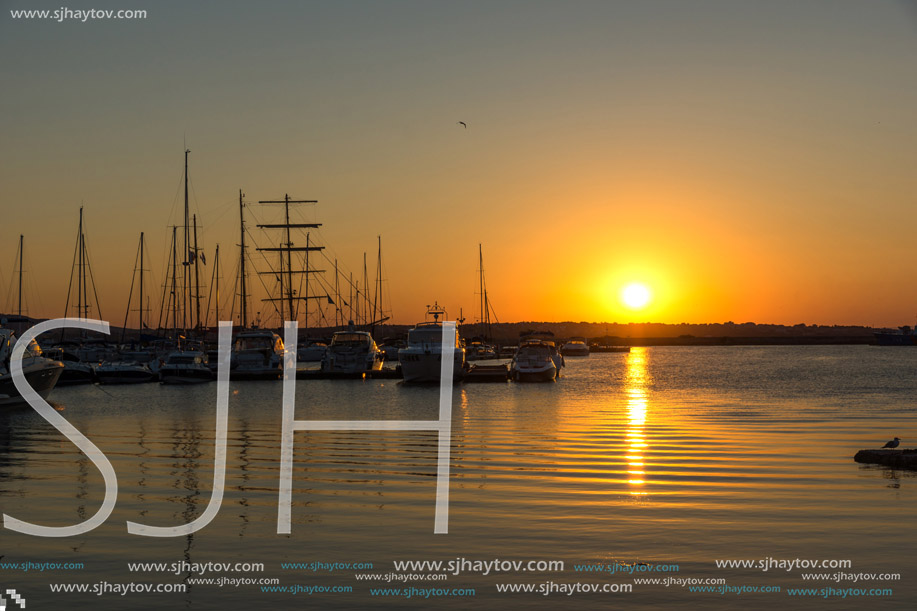 SOZOPOL, BULGARIA - JULY 11, 2016: Amazing Sunset at the port of Sozopol, Burgas Region, Bulgaria