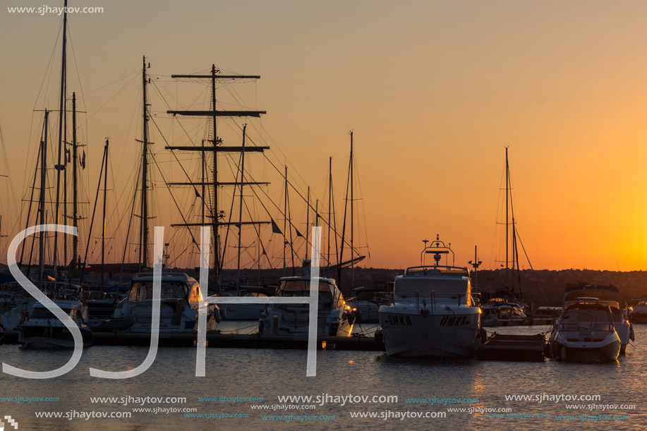 SOZOPOL, BULGARIA - JULY 11, 2016: Amazing Sunset at the port of Sozopol, Burgas Region, Bulgaria