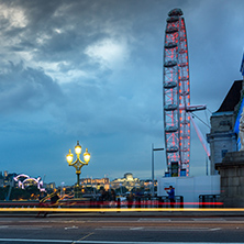 LONDON, ENGLAND - JUNE 16 2016: Night photo of The London Eye and County Hall from Westminster bridge, London, England, Great Britain