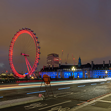LONDON, ENGLAND - JUNE 16 2016: Night photo of The London Eye and County Hall, Westminster, London, England, Great Britain