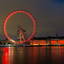 LONDON, ENGLAND - JUNE 16 2016: Night photo of The London Eye and County Hall, Westminster, London, England, Great Britain