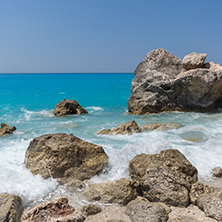 Seascape with rocks in blue waters of Megali Petra Beach, Lefkada, Ionian Islands, Greece