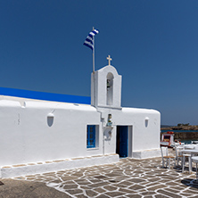 White church in town of Naoussa, Paros island, Cyclades, Greece